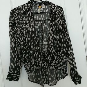 Sheer, low front flowy blouse